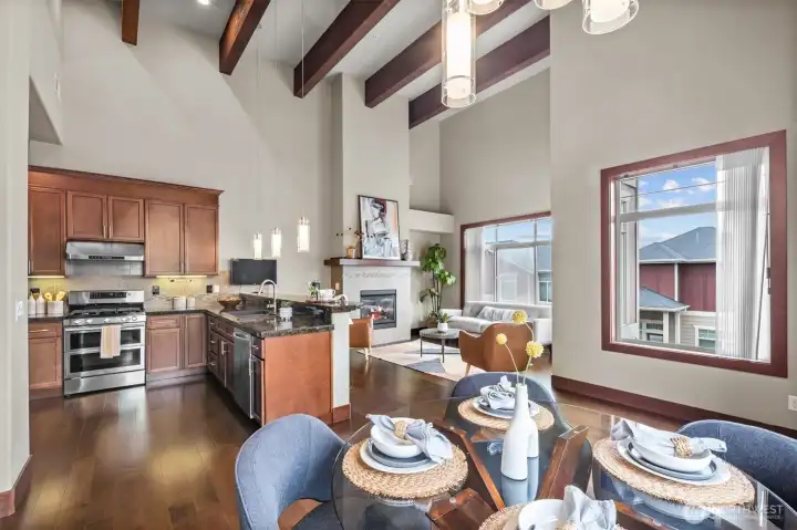 Wow! Check out those 17-foot high ceilings! A touch of class with exposed beams, cherry hardwoods, and wood wrapped windows. Wow! Check out those 17-foot high ceilings! A touch of class with exposed beams, cherry hardwoods, and wood wrapped windows.