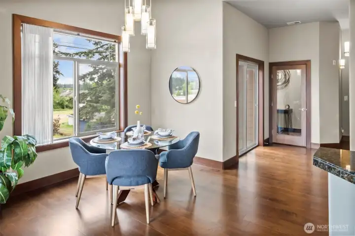 Spacious dining room with tons of natural light. And a private balcony too! Spacious dining room with tons of natural light. And a private balcony too!