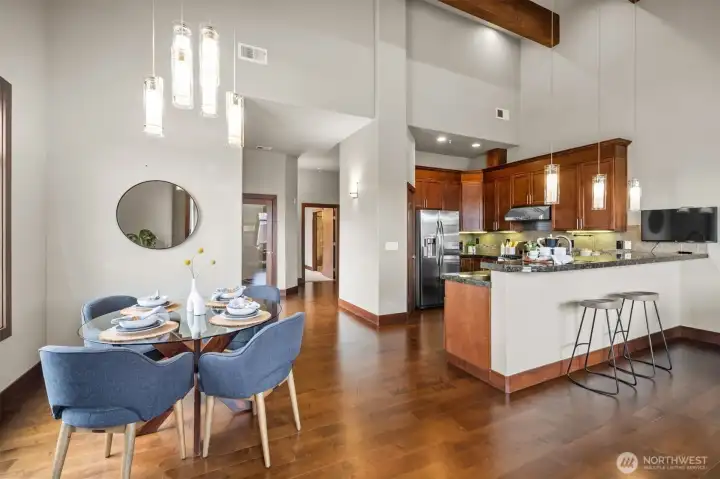 This great room style layout creates an open and welcoming feeling. Ready for guests and Seahawks games? The attached TV in the kitchen stays. This great room style layout creates an open and welcoming feeling. Ready for guests and Seahawks games? The attached TV in the kitchen stays.