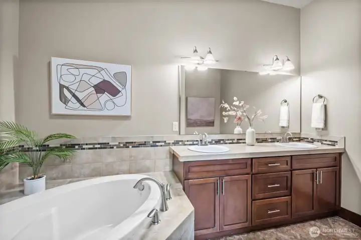 It's time for relaxing in the oversized soaking tub! And a bonus to have dual sinks with so much storage space. It's time for relaxing in the oversized soaking tub! And a bonus to have dual sinks with so much storage space.