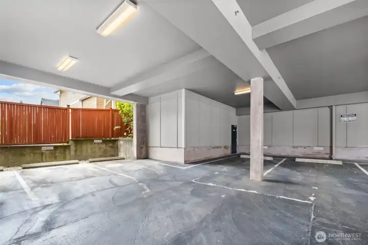 Two assigned corner parking spaces in the shared common garage. Two assigned corner parking spaces in the shared common garage.