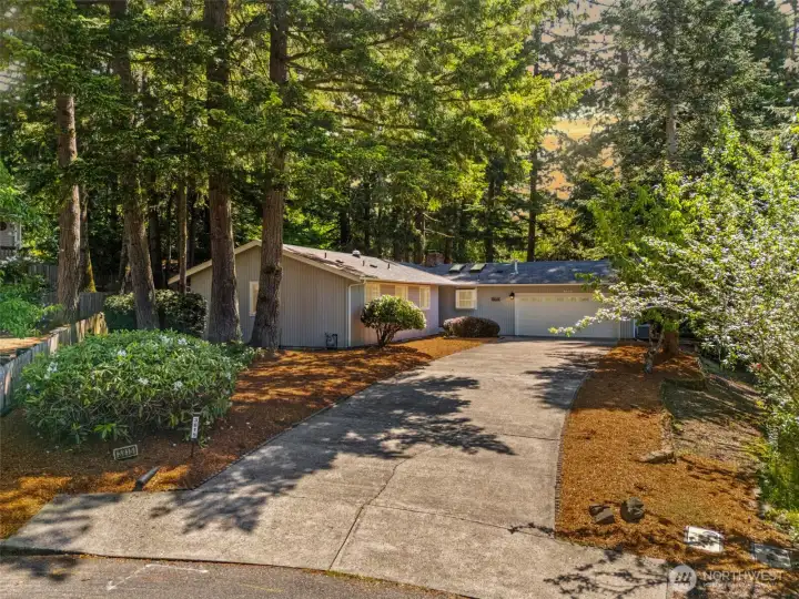 Nestled on a cul-de-sac in lovely treed setting.  Private rear yard and ample deck.