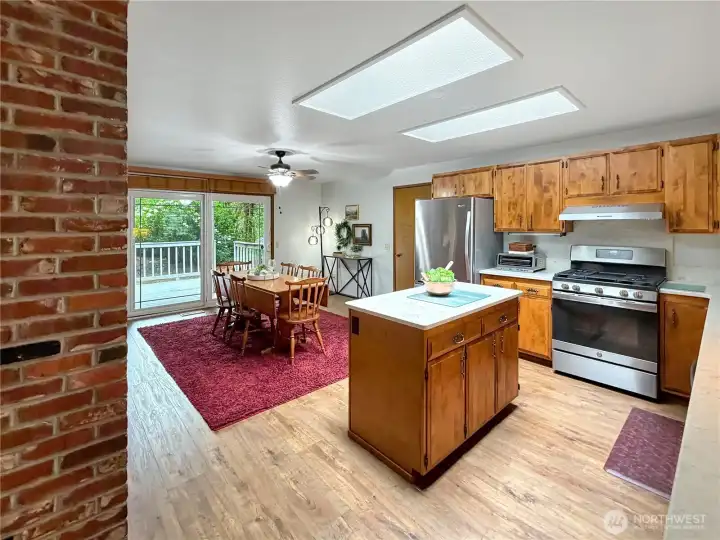 Large skylights in kitchen let in plenty of light.  Convenient access to garage.