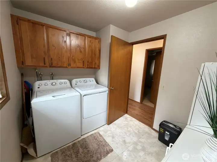 Cabinets above washer and dryer - washer and dryer included in the sale!