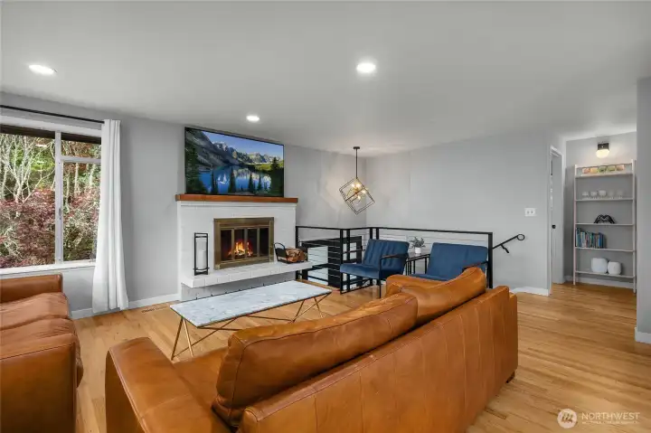 This living area offers open space into the dining and kitchen making it perfect for entertaining.