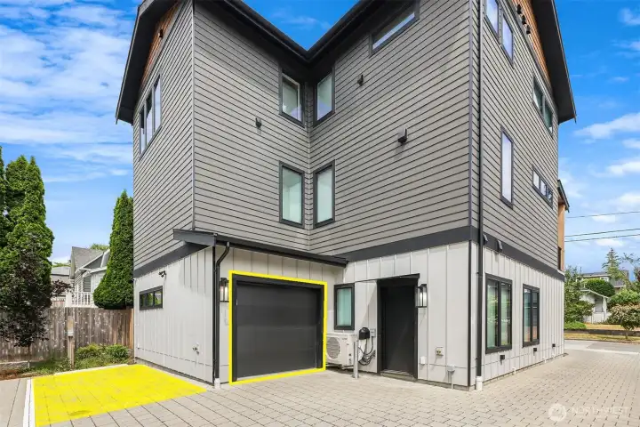 Garage and additional reserved parking - both have power for EV chargers Garage and additional reserved parking - both have power for EV chargers
