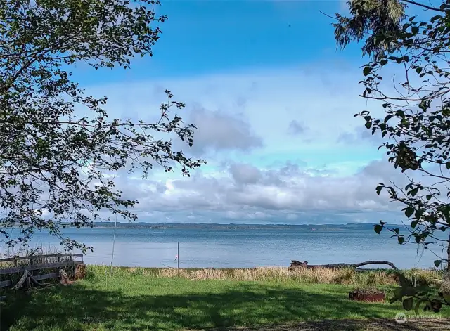 Views of the bay across the road from the lot for sale in this listing