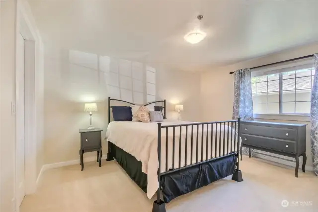 Sizeable primary bedroom with walk in closet.