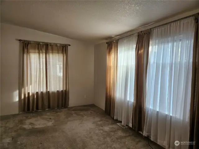 Large living room with vaulted ceiling.