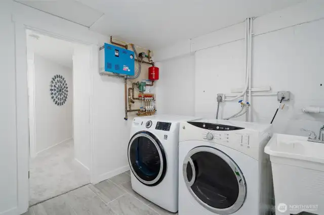 Washer & Dryer Convey, on the wall is the Radiant Heating for the entire home