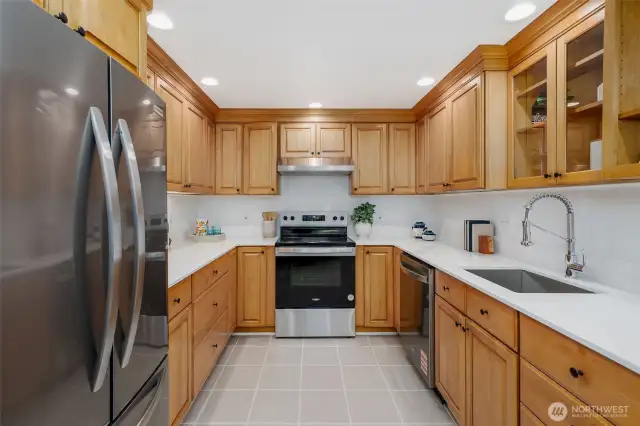 Updated Kitchen, original real wood cabinets, new SS Whirlpool Range & Dishwasher