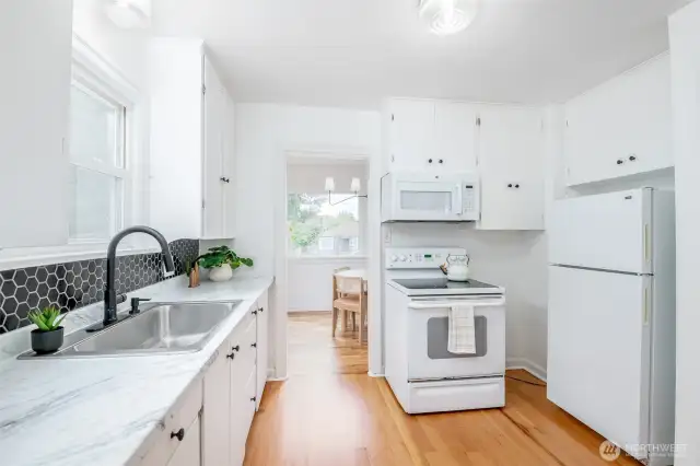 This kitchen is so lovely and bright!