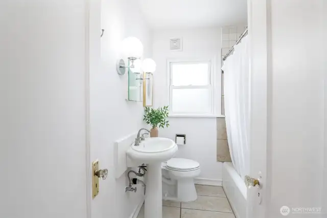 The full bath is on the main floor.