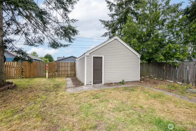 A one-car garage, located at the rear of the property, is accessible through the alley.