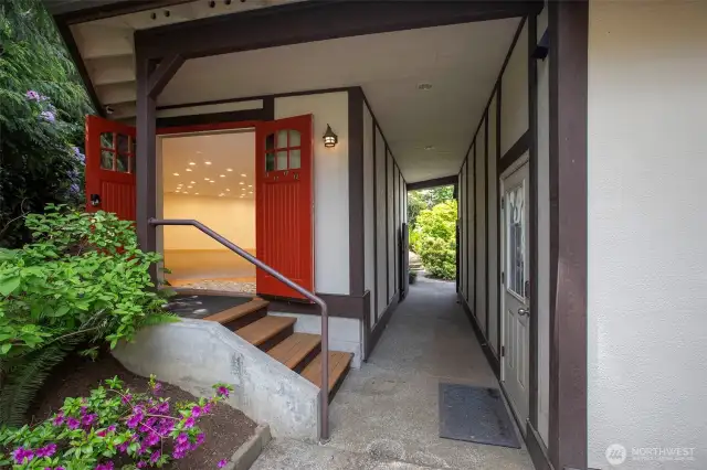 Covered Breezeway leads to this detached Studio with a 1/2 Bath