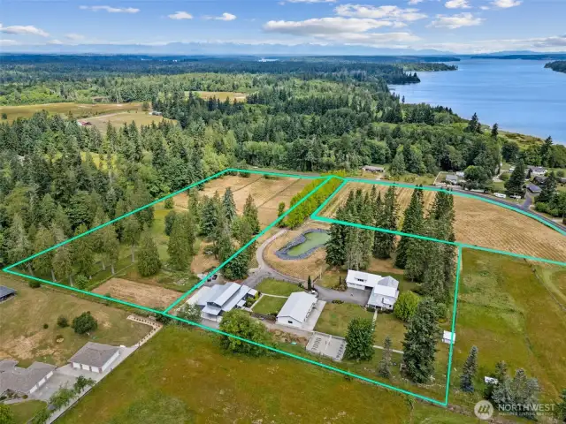 Sitting on 18+ acres and comprised of three separate parcels, this property delivers privacy, flexibility, and investment potential.