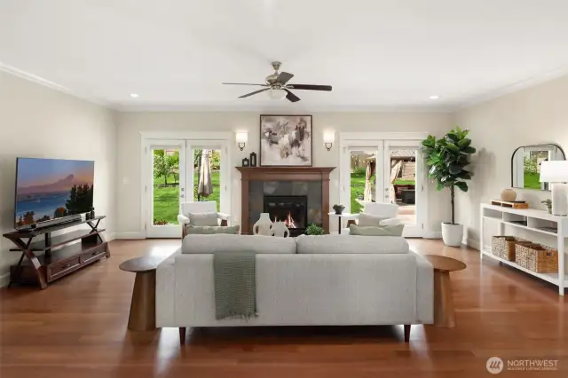 Huge family room with French doors leading out to the massive patio