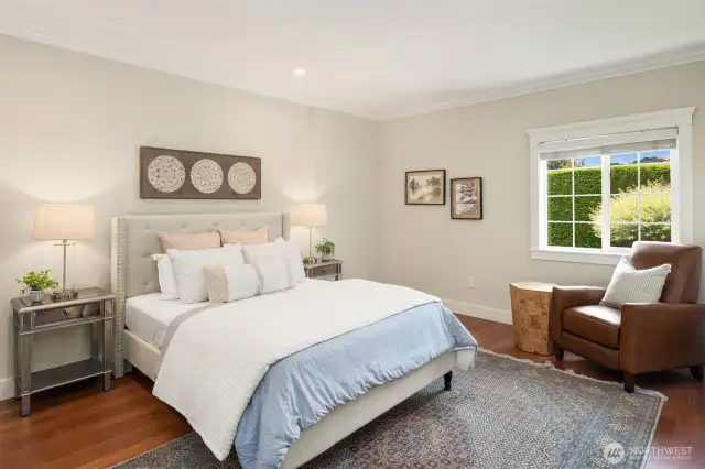 Main floor primary suite with walk-in closet and 3/4 bath.