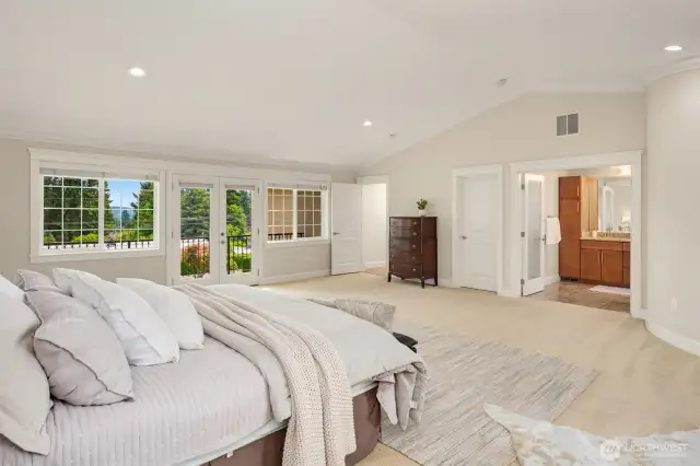 2nd floor primary suite with French doors to balcony