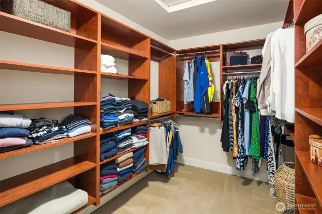 2nd floor primary bedroom walk-in closet with built-ins