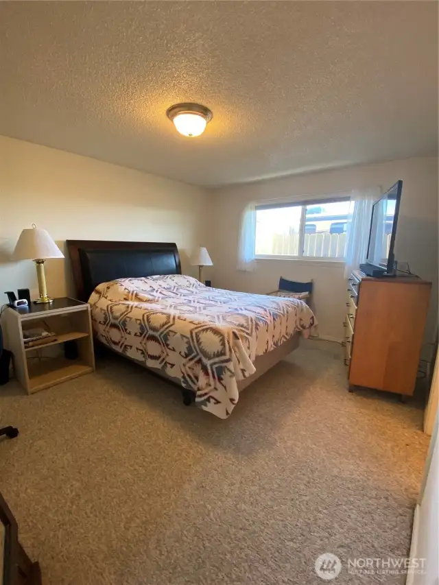 Primary bedroom with ample space to spread out