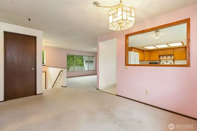Dining area looking towards entry and kitchen is to your right.