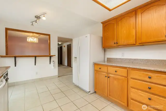 Kitchen looking towards dining room and hallway.