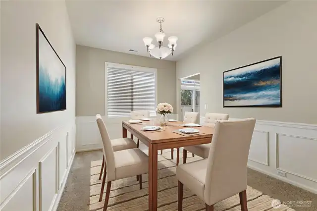 Nice sized Dining Room. Notice the wainscoting. Virtually staged.