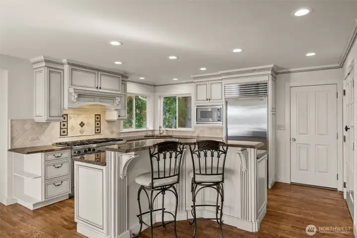 A gourmet kitchen with A Viking range and Sub Zero fridge.