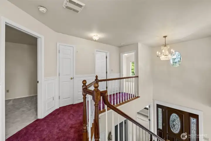 Upstairs hallway to bedrooms bath and linen closet.