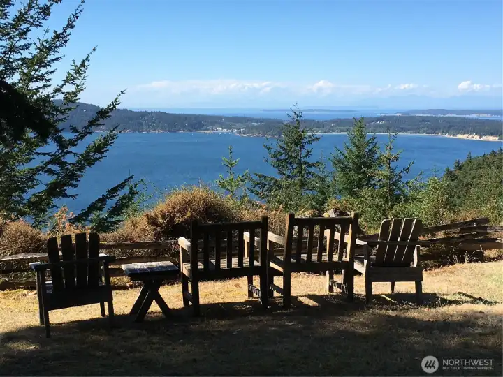 Views northerly looking over Eastsound Village and Sucia/Matia Islands, Canada beyond. This sitting area is located on the second lot where the covered bbq/picnic area is located.