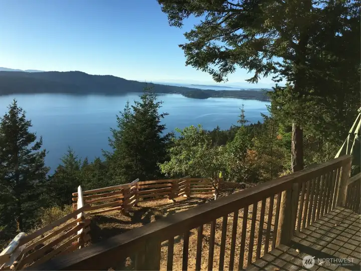 Picture taken standing on the deck overlooking Eastsound Village to the north and Canada beyond. Highbank Waterfront property.
