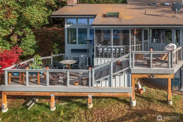 West side of the home showcases the outdoor space and the abundance of windows, bringing in natural light to every room.