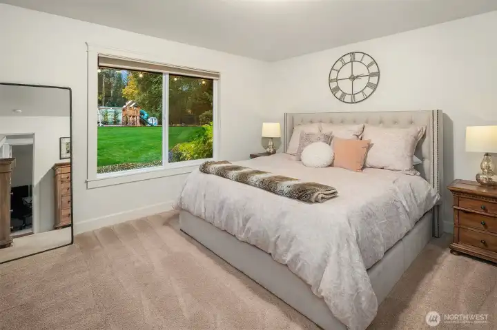 Primary suite with five-piece bath & walk-in closet