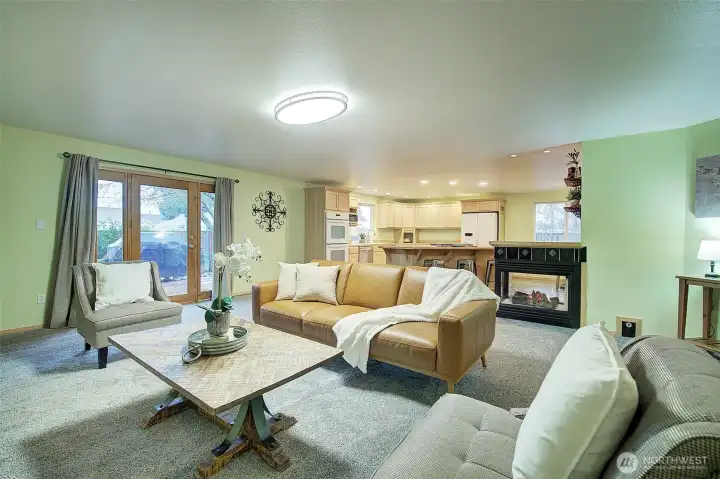 door leads out onto the deck and fully fenced back yard.