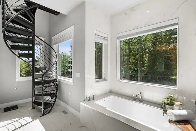 Spiral staircase leading up to view office!