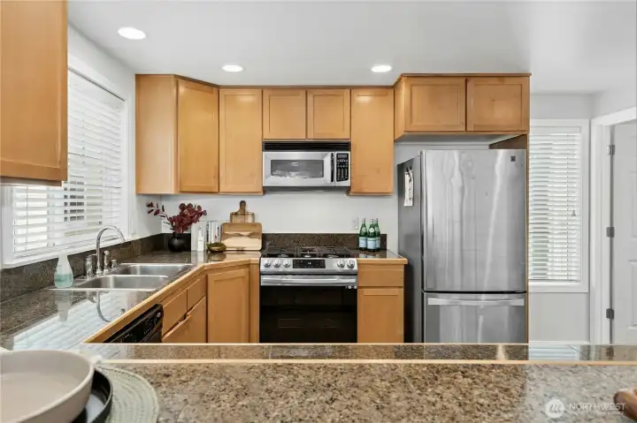 Granite Counters and tons of cabinet space