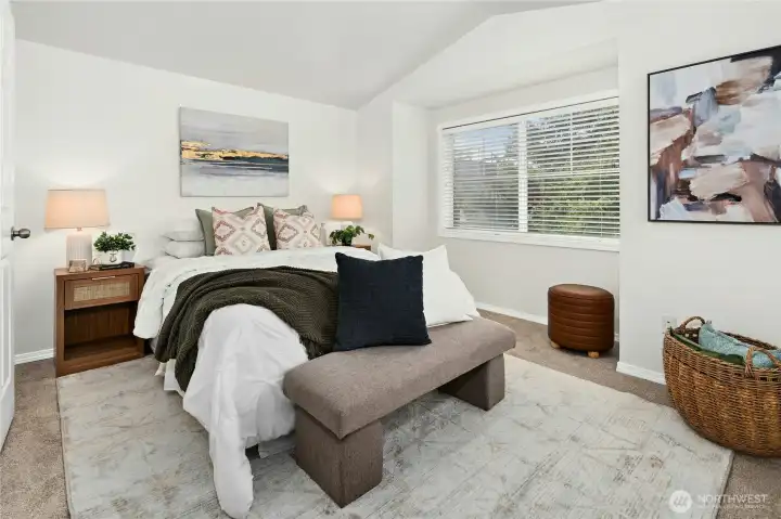 Primary suite with fresh paint, plush new carpet, and abundant natural light.