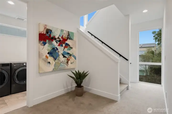 The stairwell and landings are bathed in light, making it feel so inviting in every space. The 2nd floor landing is also large enough for an office set up, pet corner or more storage space.