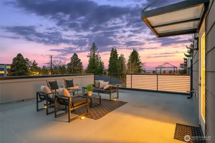 The top floor is a wonderful roof top deck with over 1000 sqft of space. Stubbed for gas for grilling but also plumbed for an outdoor kitchen. Views looking west to the Olympic Mountains.