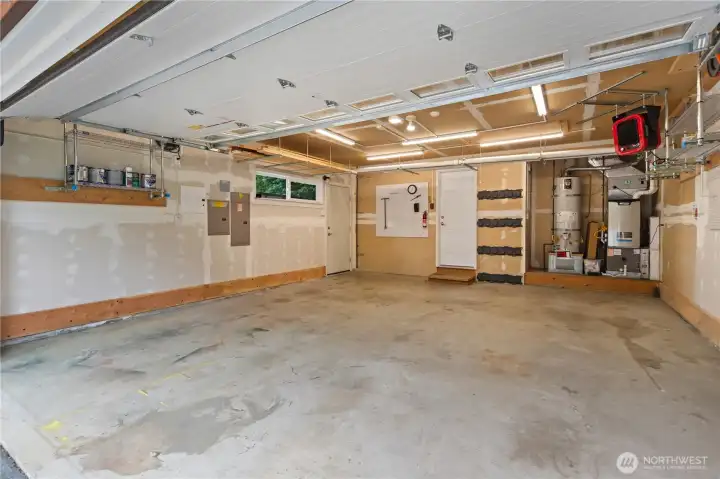 Garage with heater, wall mounted/jackshaft. garage door opener. Generator outside man door. Garage with heater, wall mounted/jackshaft. garage door opener. Generator outside man door.