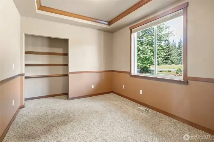 The den off the entry that could be converted into a 4th bedroom or continue to use as a home office.