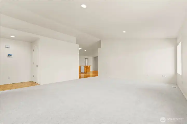 Quite a good sized space! AC to keep you cool! Step into a light-filled living space featuring vaulted ceilings, skylights, crisp white trim, and a large bay window that brings in beautiful natural light throughout the day. The open concept layout creates an inviting flow ideal for both everyday living and gathering with guests. Quite a good sized space! AC to keep you cool! Step into a light-filled living space featuring vaulted ceilings, skylights, crisp white trim, and a large bay window that brings in beautiful natural light throughout the day. The open concept layout creates an inviting flow ideal for both everyday living and gathering with guests.