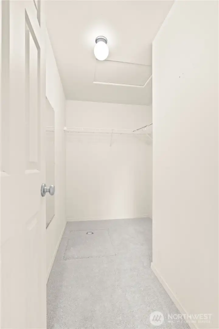 Walk In Closet: The spacious primary suite offers a quiet retreat with ample room to unwind, along with an expansive walk-in closet and private 5-piece ensuite bathroom. Thoughtfully separated from the main living spaces, this layout provides added privacy and comfort within the home. Walk In Closet: The spacious primary suite offers a quiet retreat with ample room to unwind, along with an expansive walk-in closet and private 5-piece ensuite bathroom. Thoughtfully separated from the main living spaces, this layout provides added privacy and comfort within the home.