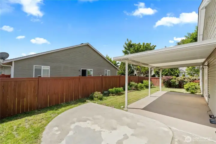 The fully fenced backyard offers a private outdoor setting with room for gardening, pets, or relaxing in the fresh PNW air. A covered patio creates the perfect space for year-round outdoor enjoyment, whether hosting friends or enjoying a quiet morning coffee. The fully fenced backyard offers a private outdoor setting with room for gardening, pets, or relaxing in the fresh PNW air. A covered patio creates the perfect space for year-round outdoor enjoyment, whether hosting friends or enjoying a quiet morning coffee.
