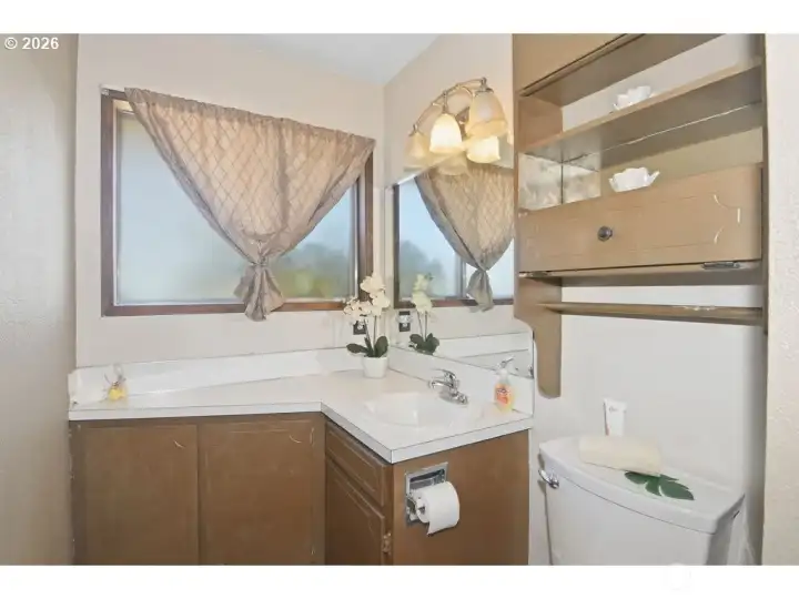 Main bathroom with tub and shower,