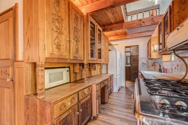 Hand carved kitchen cabinets are truly one of a kind!