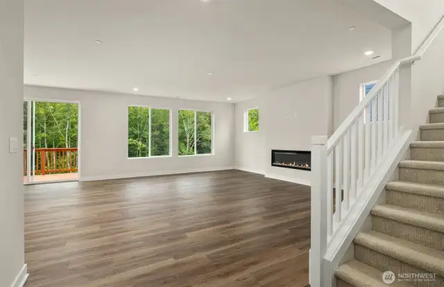 Living room with stairs to upper floor