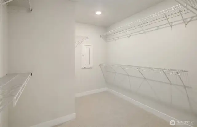 Storage off of ensuite in primary bath.