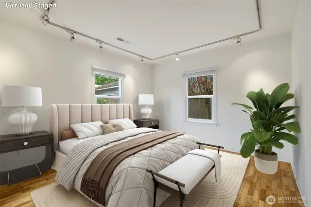 Here is the first of two bedrooms.  Each room has two windows and a good size closet with built-in storage space.